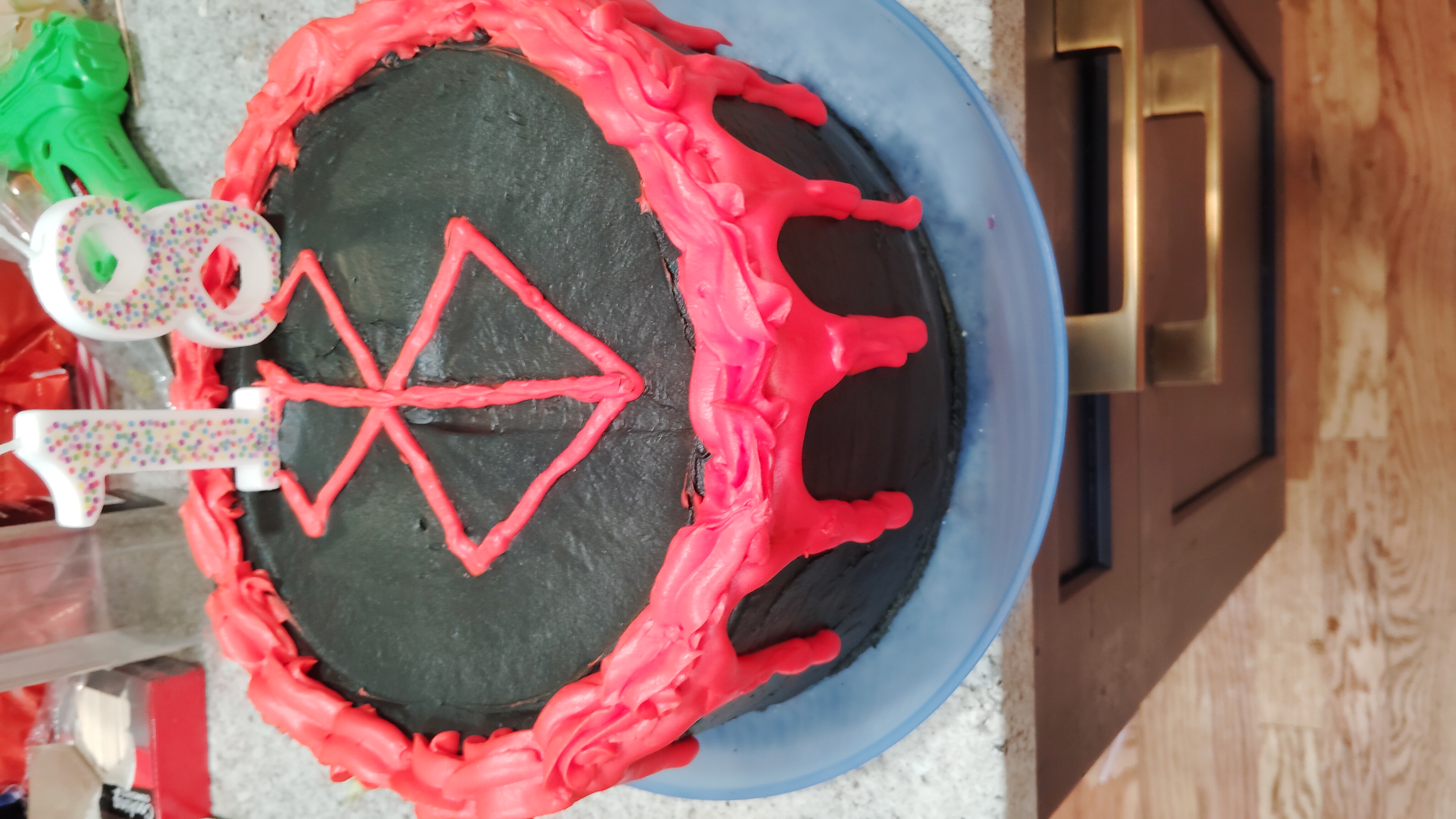Black and red celebration cake